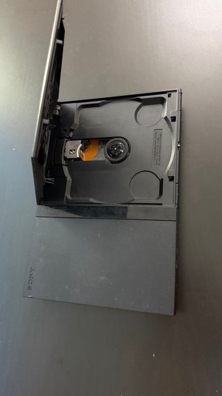 Playstation 2 Slim Negra + 4 Juegos y mando