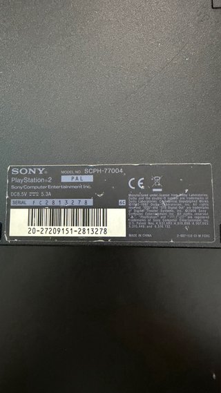 Playstation 2 Slim Negra + 4 Juegos y mando