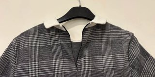 Abito a quadri grigio e bianco