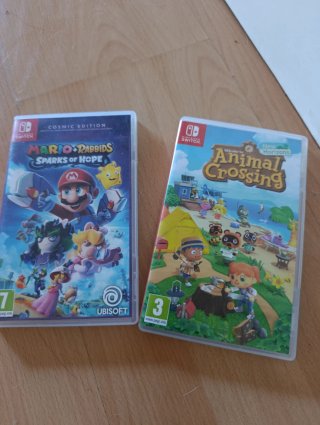 Nintendo Switch Lite Coral + Custodia