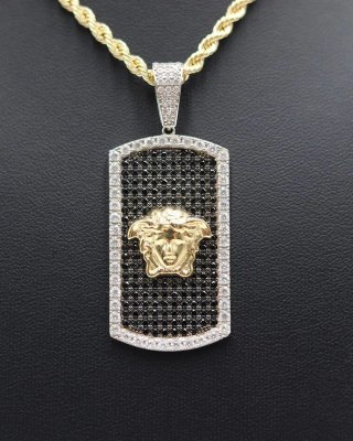 Colgante bicolor con medusa y circonitas 18k