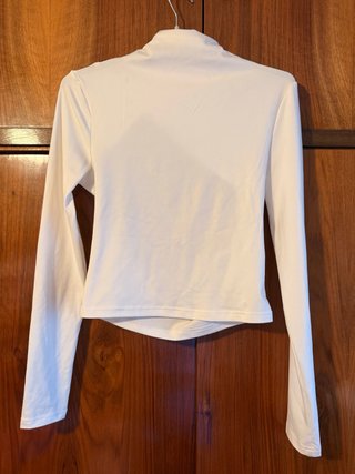 Top cuello alto y manga larga
