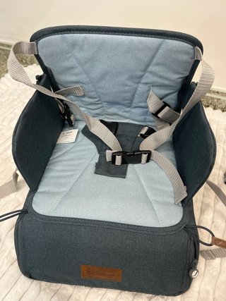 Asiento elevador Jané convertible en bolso