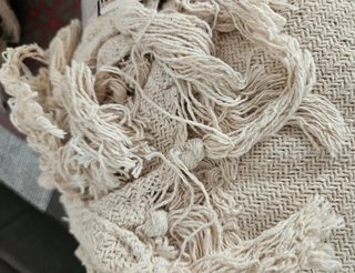 Colcha de algodón tejida con flecos