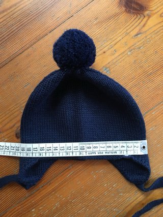 Berretto neonato in misto lana blu con pompon