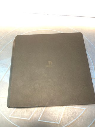 PS4 Slim Negra + Mando y Soporte