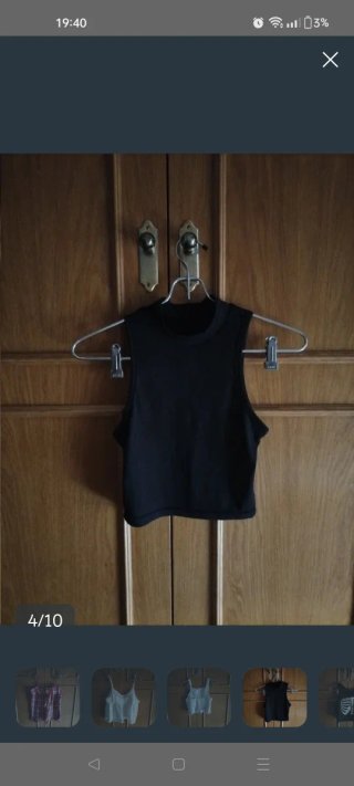 Top negro cuello alto sin mangas