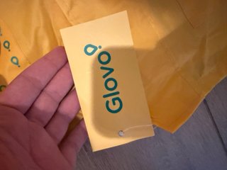 Chaqueta impermeable Glovo amarilla