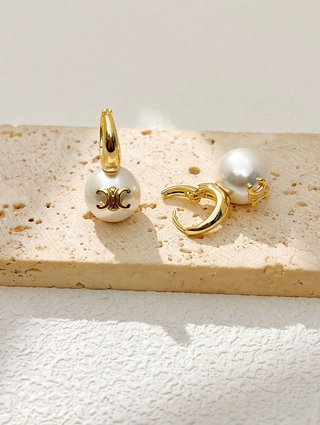 Orecchini Celine dorati con perla elegante