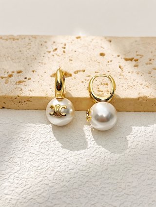 Orecchini Celine dorati con perla elegante