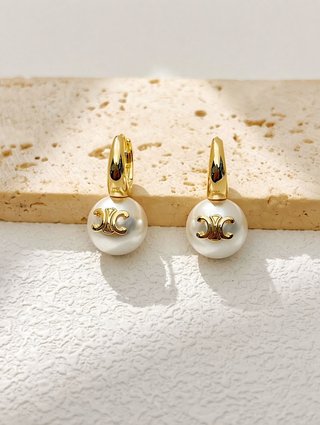 Orecchini Celine dorati con perla elegante