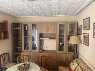 Mueble de salón madera y cristal