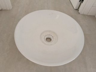 Lavabo redondo de porcelana blanco