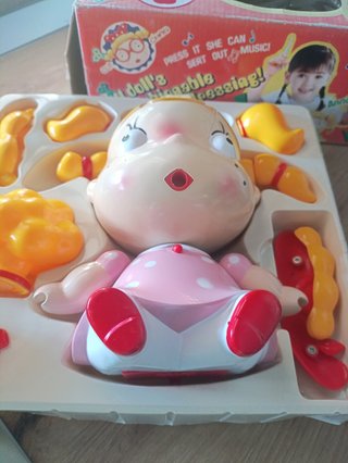 Muñeca de colección con sonido