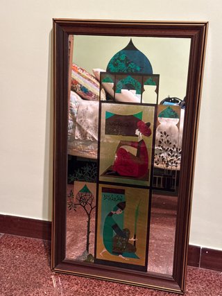 Espejo decorativo con arte oriental