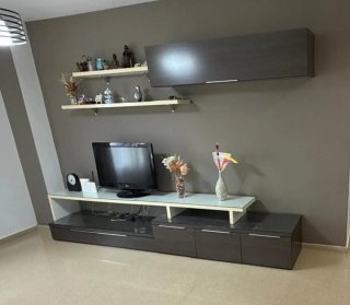 Mueble de salón madera y cristal