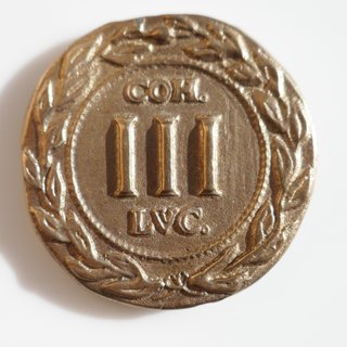 Moneda antigua copia Spintria Arde Lucus