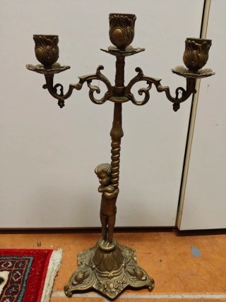 Candelabro ottone con putto