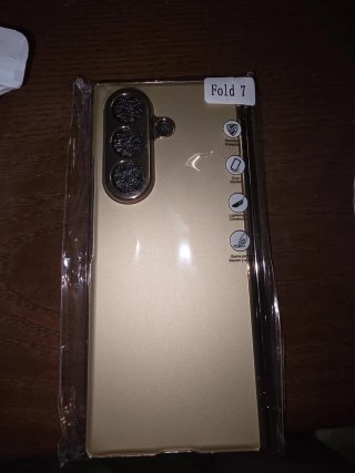 Funda móvil negra,plateado y dorada