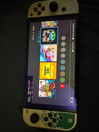 Nintendo Switch OLED + 6 juegos + 2 mandos