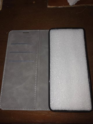 Funda móvil gris tipo libro