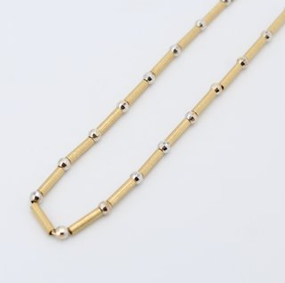 Cadena de oro combinado de 18k. Peso: 12.98 gr.