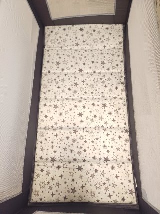 Cuna de viaje estrellas