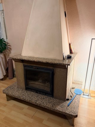 Estructura de piedra y granito chimenea de leña