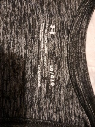 Camiseta tirantes Under Armour gris