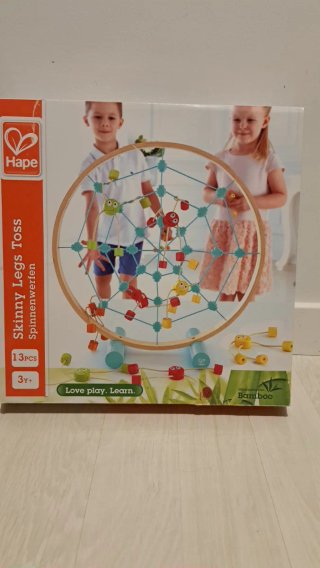 Juego de madera Hape Skinny Legs Toss