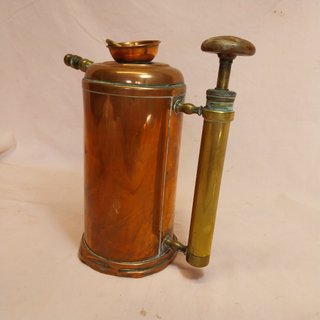 Antiguo pulverizador de cobre