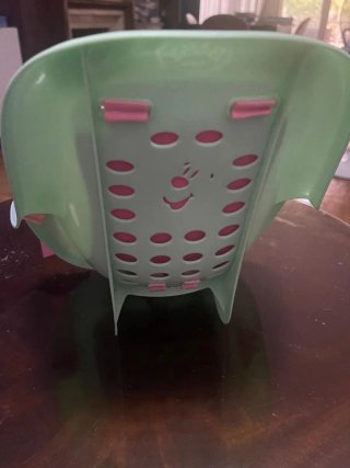 Cochecito de juguete con funda