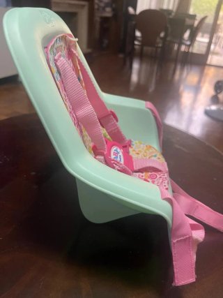 Cochecito de juguete con funda