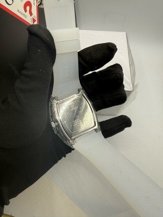 Reloj Guess Transparente y Plateado