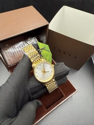 Reloj Gucci Dorado y Plateado