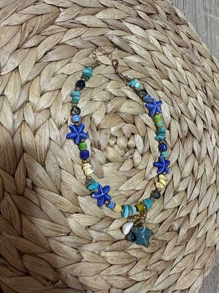 Colgante con charms de quita y pon y abalorios
