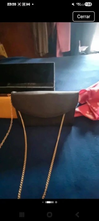 2 Bolsos de mano . Uno para.movil y cartera fiesta