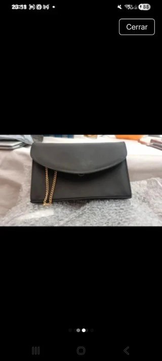 2 Bolsos de mano . Uno para.movil y cartera fiesta