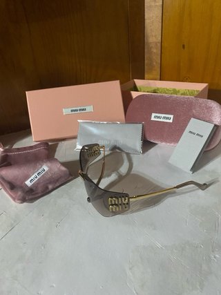 Occhiali da sole Miu Miu marroni