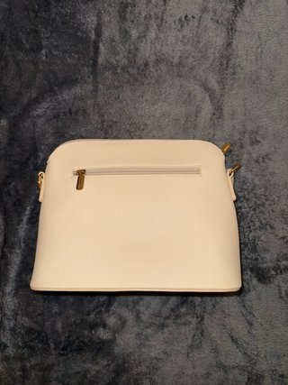 Bolso de mano y neceser beige y negro
