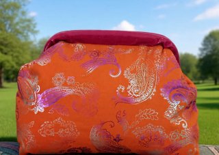 Pochette in tessuto arancione e viola