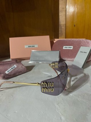 Occhiali Miu Miu Viola