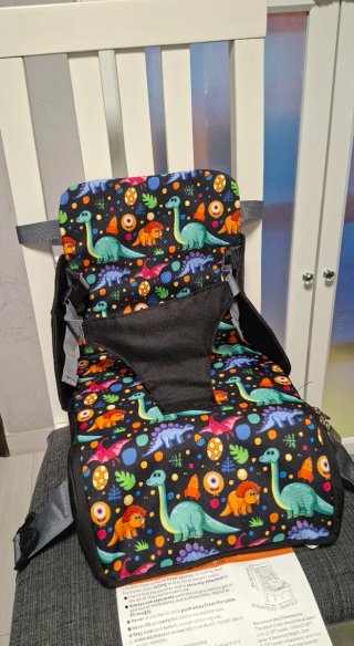 Trona portátil para viaje o asiento elevador.