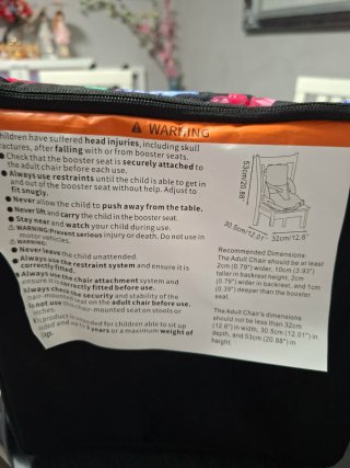 Trona portátil para viaje o asiento elevador.