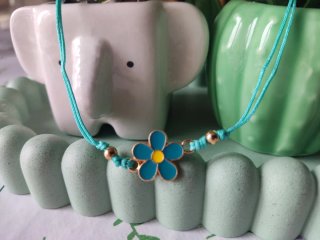 Pulsera Flor Azul y Dorada