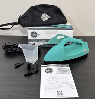 Plancha de viaje Xsteam verde azulado