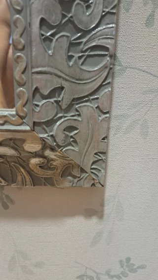 Espejo plateado decorativo