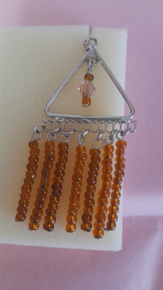 Pendientes de plata con cuentas marrones