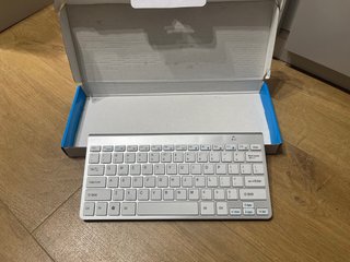 Teclado inalámbrico multimedia con caja