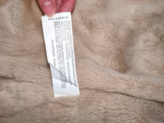 Parka verde con capucha de pelo y forro polar